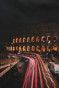 High angle view of light trails on road at night