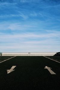 Road against blue sky