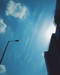 Low angle view of building against blue sky