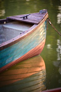 Fishing boat moored in lake