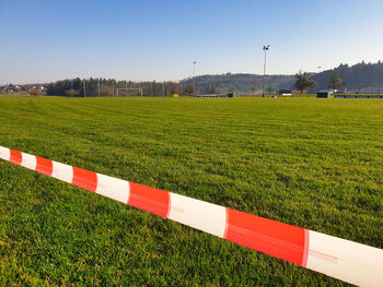 Scenic view of field against clear sky