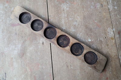 High angle view of coins on table