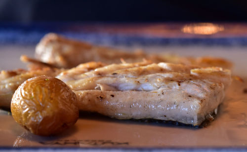 Close-up of meat on barbecue grill