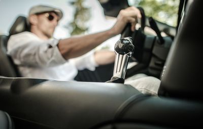 People sitting in car