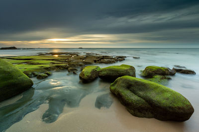 Scenic view of sea against sky during sunset