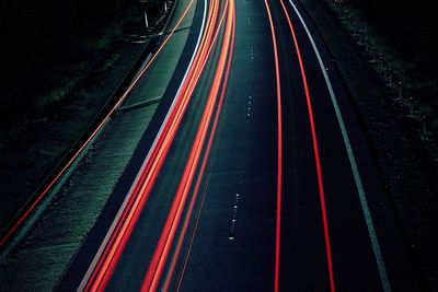 High angle view of light trails on highway