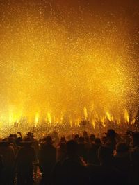 Group of people at popular fire party 