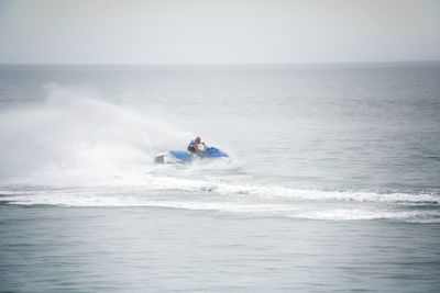 Man surfing in sea