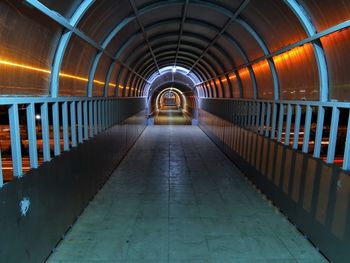 Illuminated corridor at night