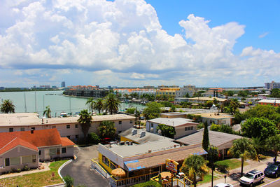 High angle view of town against cloudy sky