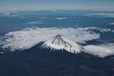 Scenic view of snowcapped mountain against sky