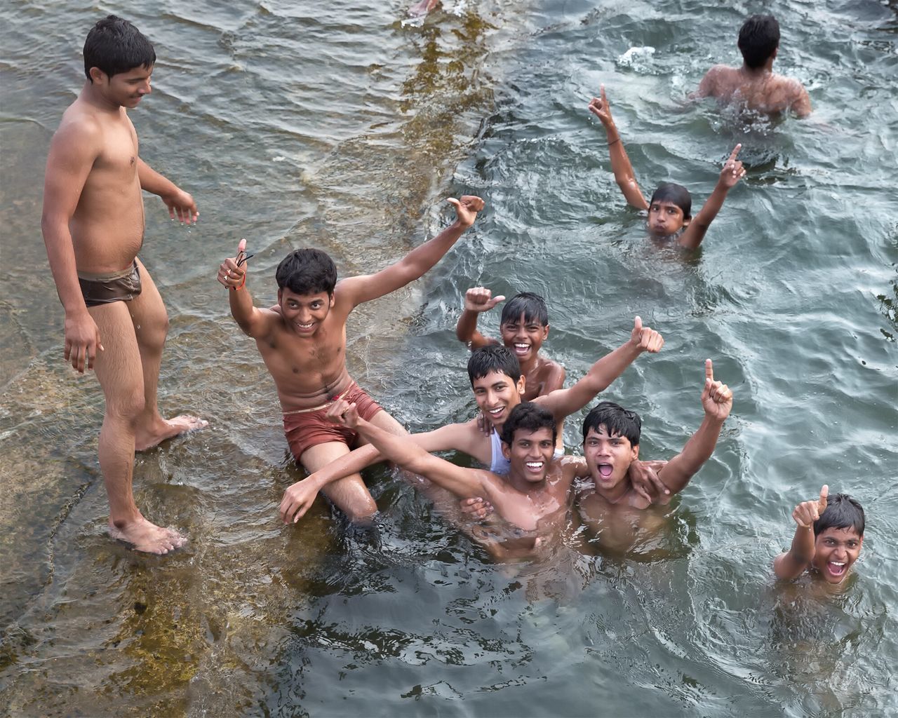water, swimming, leisure activity, lifestyles, togetherness, waterfront, enjoyment, fun, high angle view, happiness, lake, childhood, rippled, vacations, boys, girls, full length, day
