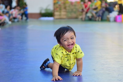 Portrait of smiling boy in swimming pool