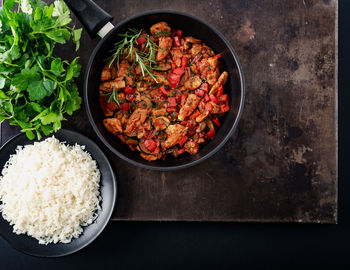 High angle view of chopped vegetables in bowl on table