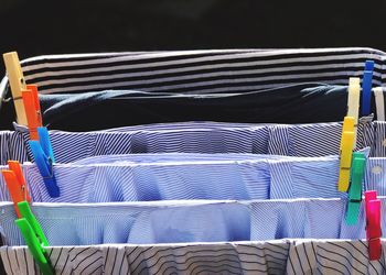 Close-up of multi colored clothes drying outdoors