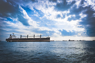 Pier over sea against sky