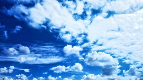 Low angle view of clouds in blue sky