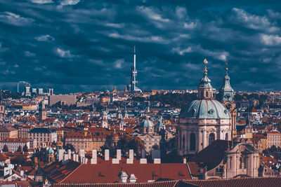 High angle view of buildings in city against sky