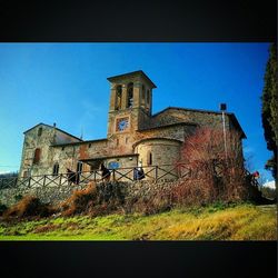 Low angle view of church against blue sky