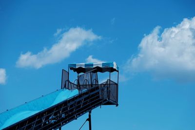 Low angle view of building against blue sky