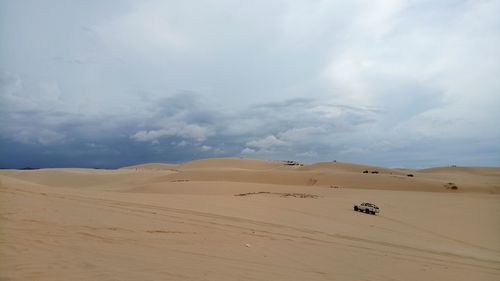 Scenic view of desert against sky