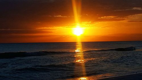 Scenic view of sea against sky during sunset