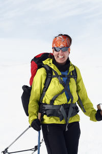 Smiling woman skiing, sarek national park, lapland, sweden