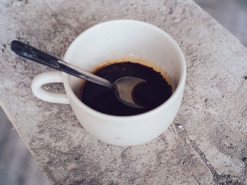 High angle view of coffee cup on table