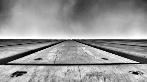 Low angle view of built structure against cloudy sky