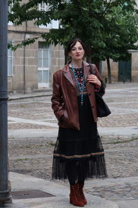 Young woman standing outdoors