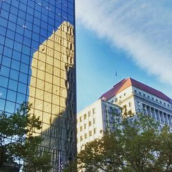 Low angle view of modern building against sky