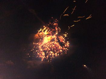 Firework display at night