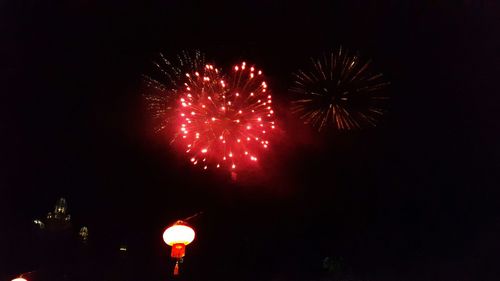 Low angle view of firework display