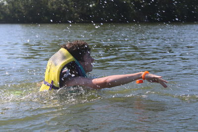 Man swimming in sea