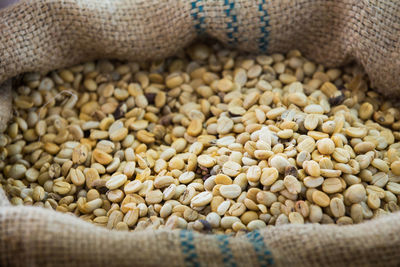 High angle view of coffee beans in container