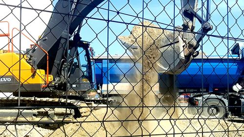 Low angle view of chainlink fence against clear sky