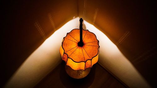 Close-up of illuminated lantern at home