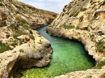 High angle view of river amidst rocks