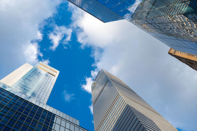 Low angle view of modern buildings against sky