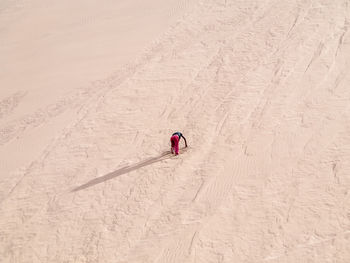 High angle view of person skiing on sand