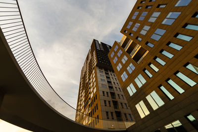 Low angle view of skyscraper against sky