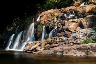 View of waterfall in forest