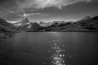 Scenic view of mountains and lake against sky