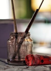 Close-up of hand painting on table