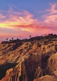 Scenic view of landscape against sky during sunset