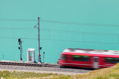 Blurred motion of train on bridge in city