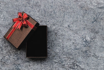 High angle view of box on concrete wall