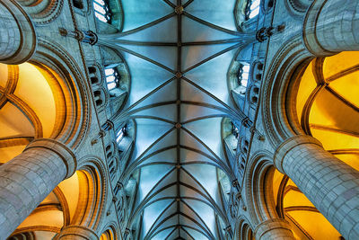 Low angle view of ornate ceiling in temple