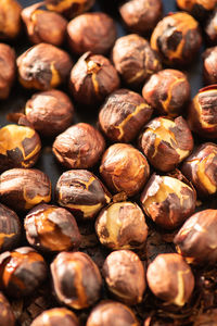 Hazelnuts roasted in an oven. close up.