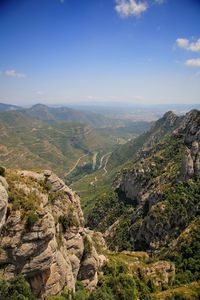 Scenic view of tree mountains against sky